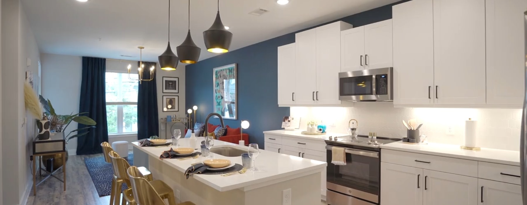 a kitchen with white cabinets